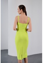 Жовта елегантна сукня довжини міді
