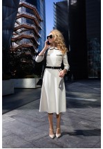 Біла міді-сукня з чорним оздобленням