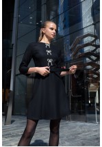 Чорна сукня з перловими бантами