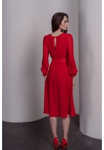 Яскрава червона сукня міді