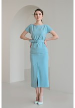 Подовжена міді спідниця з розрізом спереду