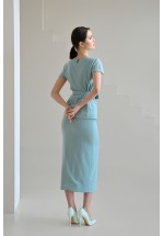 Подовжена міді спідниця з розрізом спереду