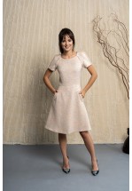 Бежева сукня із твіду оздоблена бахромою