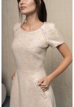 Бежева сукня із твіду оздоблена бахромою