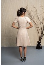 Бежева сукня із твіду оздоблена бахромою