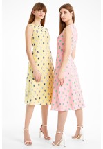 Яскрава жовта сукня міді