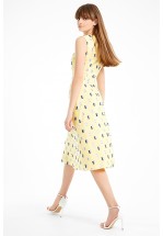 Яскрава жовта сукня міді