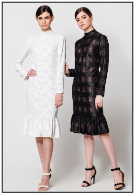 Чорна сукня міді зі збіркою