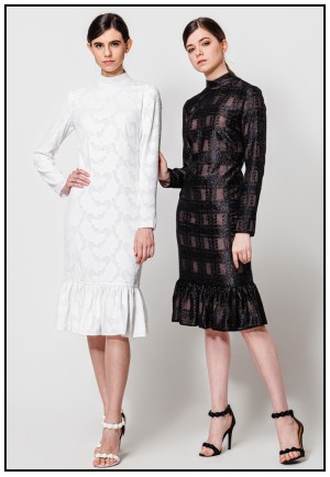 Чорна сукня міді зі збіркою