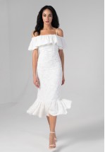 Коктейльна біла сукня з воланами