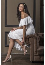 Коктейльна біла сукня з воланами