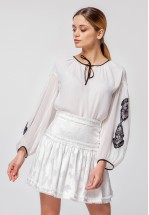 Ніжна молочна міні-спідниця