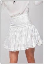 Ніжна молочна міні-спідниця