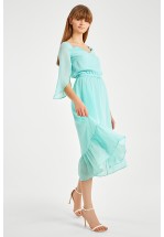 Сукня міді мʼятного кольору